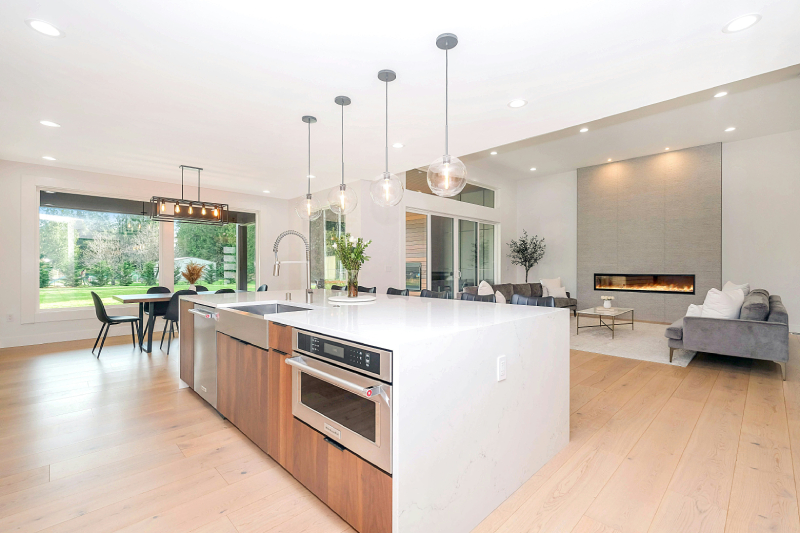 modern home with downlights and pendant lights